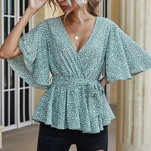 Sage green top with white leopard print